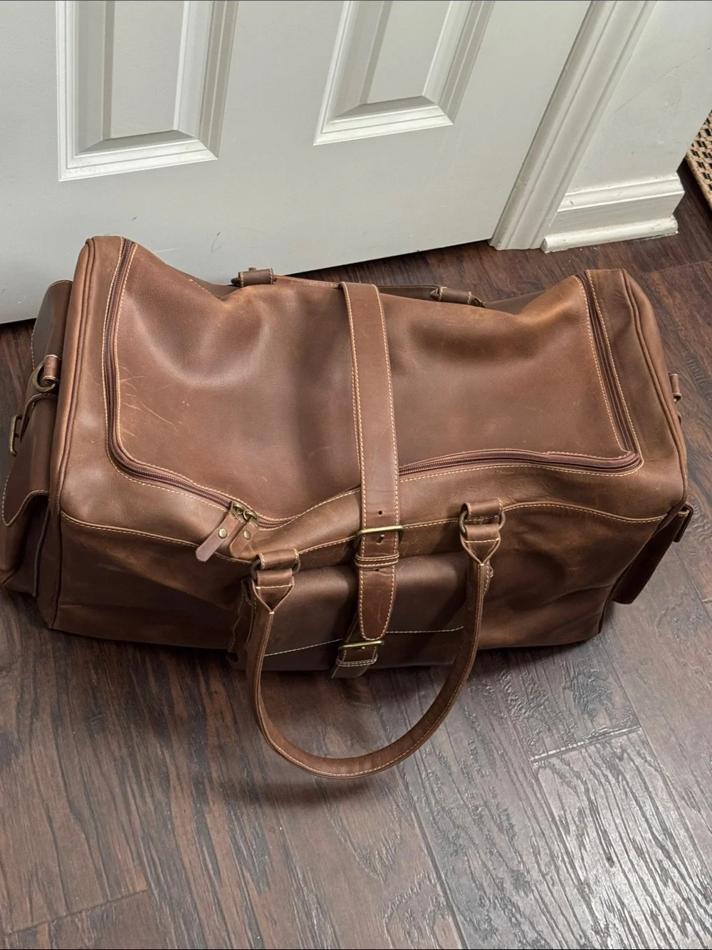 Classic Brown Distressed Leather Duffel Bag with Front Buckle Pocket, no strap